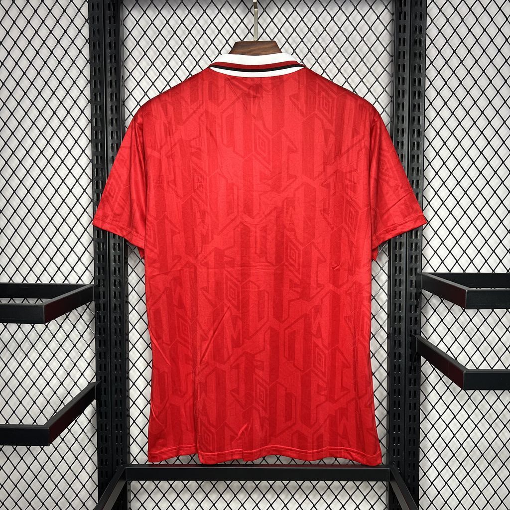 Red football jersey back with white-and-red striped collar trim and Umbro logo