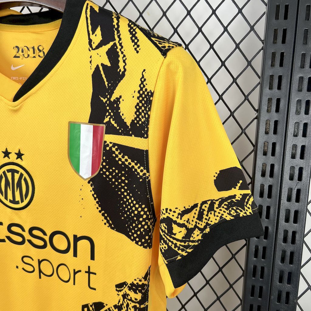 Yellow Inter Milan jersey with black graphic, Italian flag crest and Nike logo