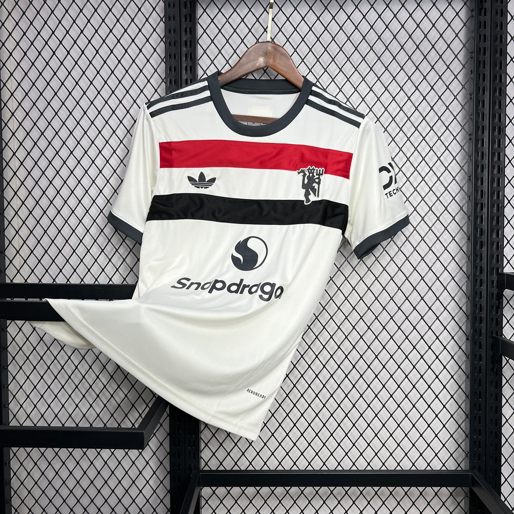 White third football jersey with red and black stripes, crest, and sleeve adidas-style logo