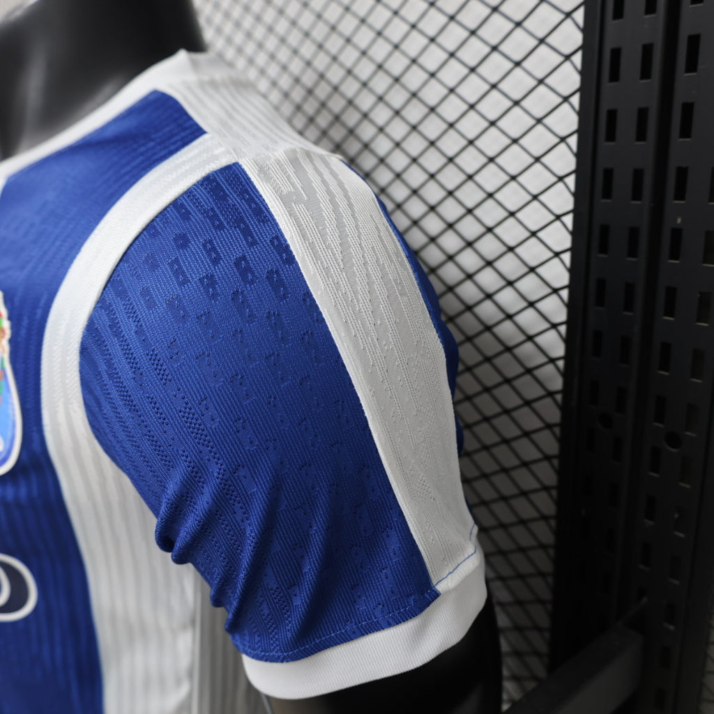 Football jersey sleeve with blue textured pattern and white contrast stripe