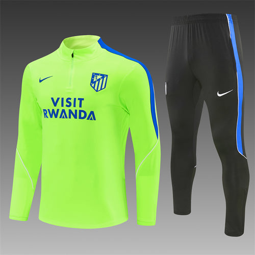 Neon green quarter-zip training top with blue trim and matching black track pants