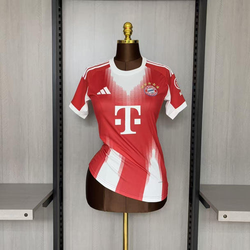 Women’s red home soccer jersey with white trim, Bayern crest and sponsor T