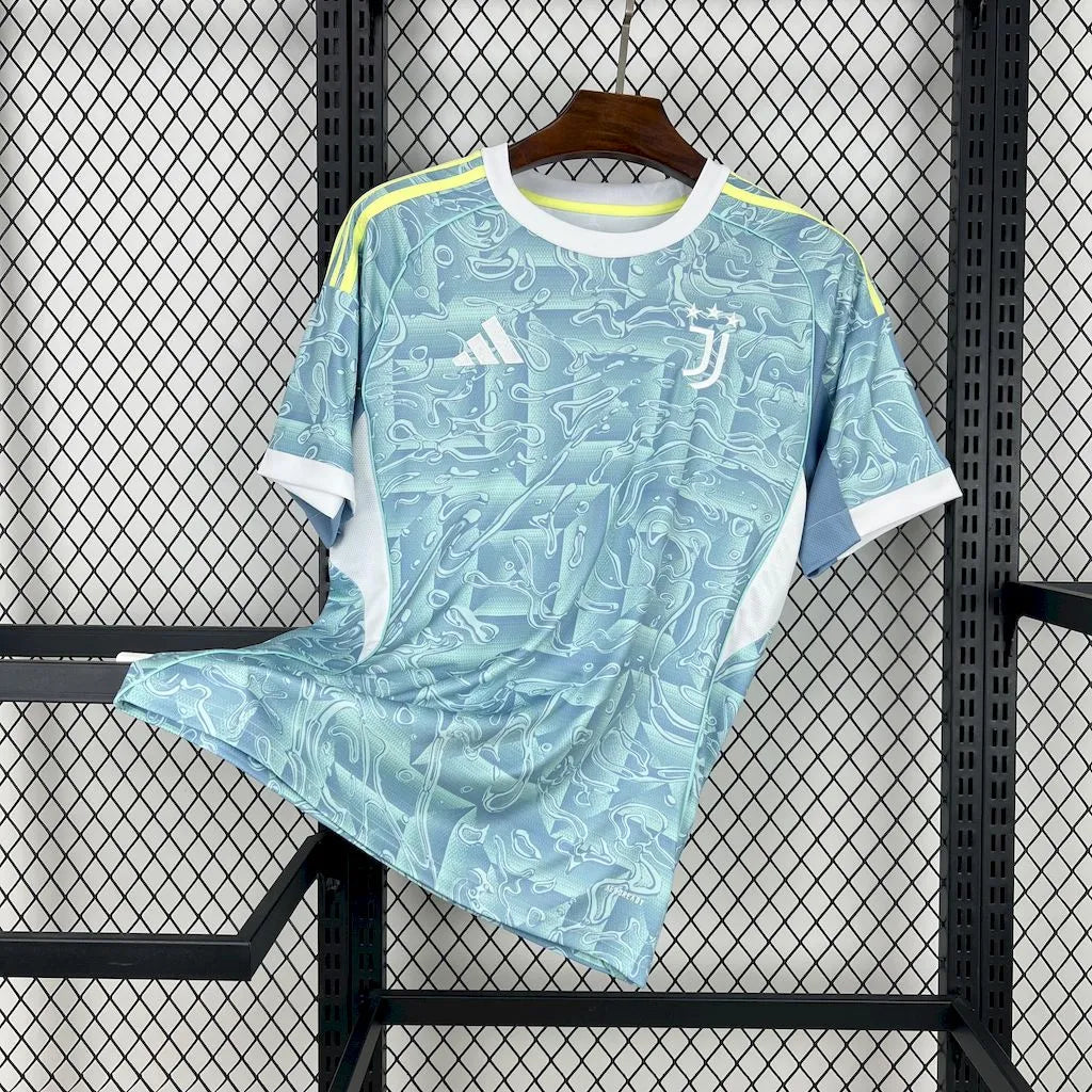 Juventus away fan jersey in light blue with white collar and abstract graphic print