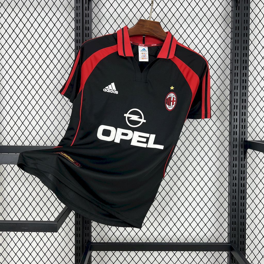 Black AC Milan soccer jersey with red stripes, adidas logo, Opel sponsor, crest