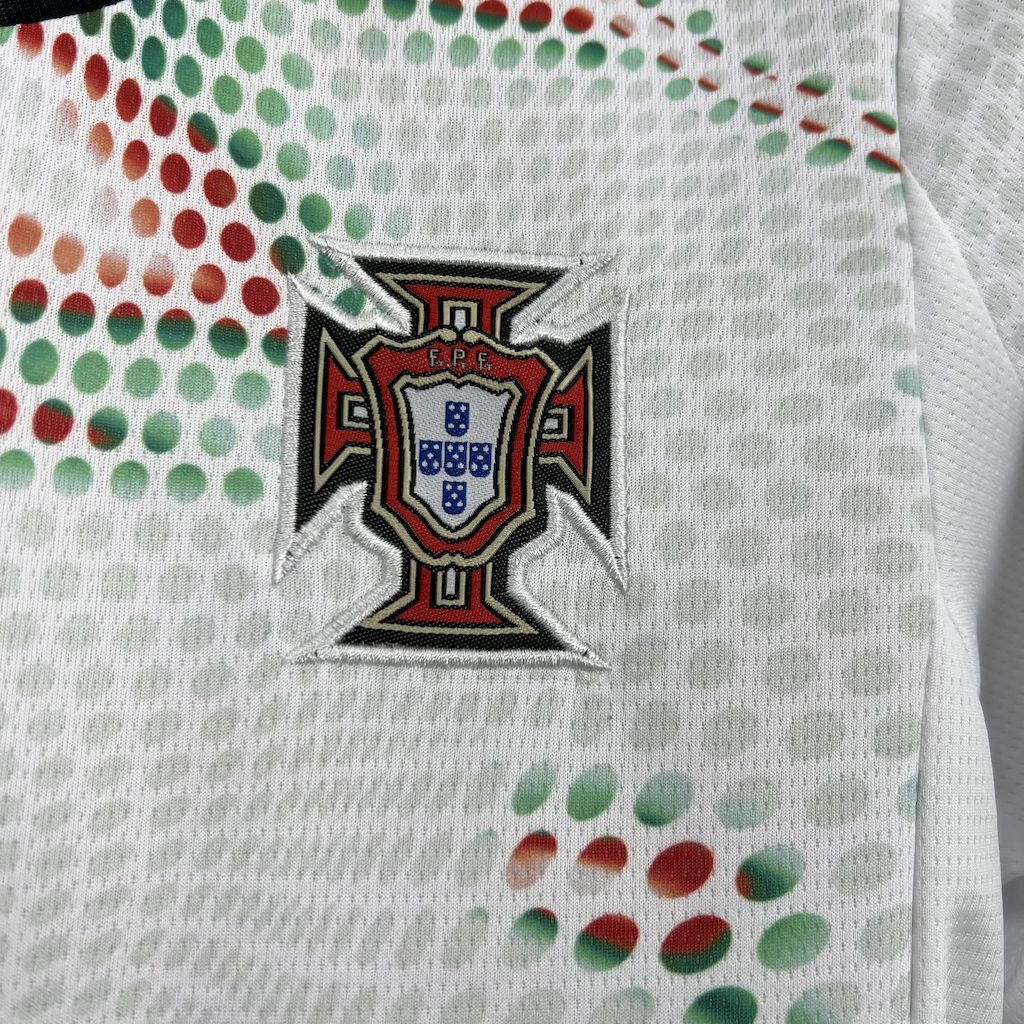 Portugal crest patch on white kids jersey, surrounded by multicolor dot swirl