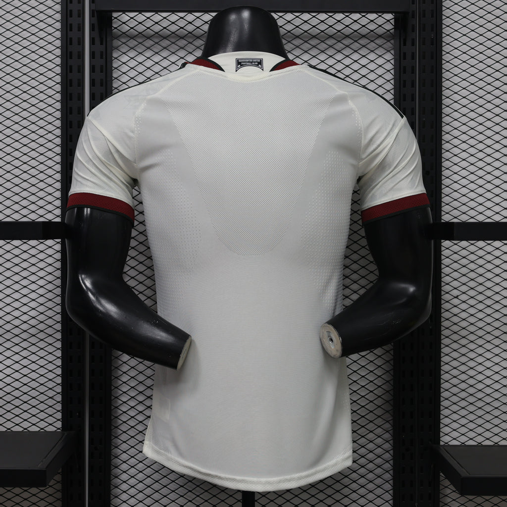 White Manchester United third player football shirt back with maroon and black stripes
