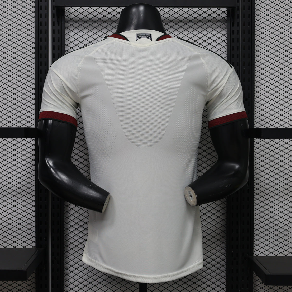 White Manchester United third player football shirt back with maroon and black stripes