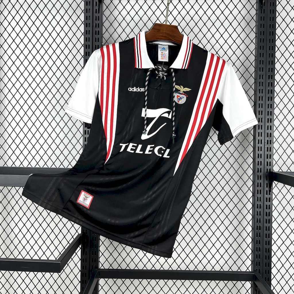 Black retro football jersey with white and red vertical stripes, Adidas and Telecel logos
