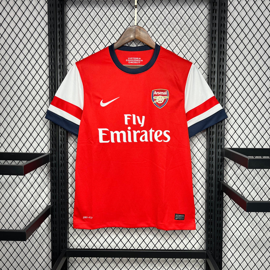 Red Arsenal home football jersey with Fly Emirates sponsor and navy trim