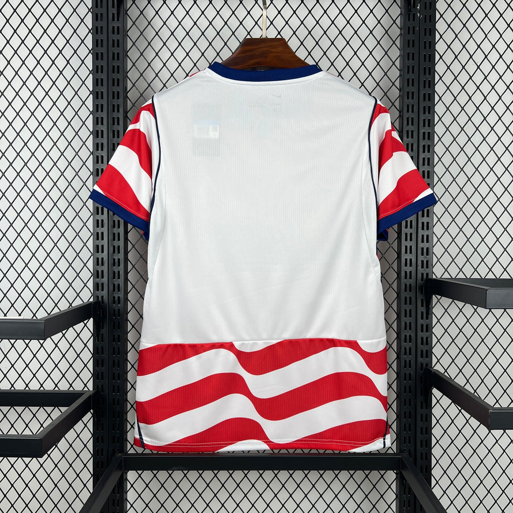 USA soccer jersey back view, white with red wavy stripe at hem and blue collar