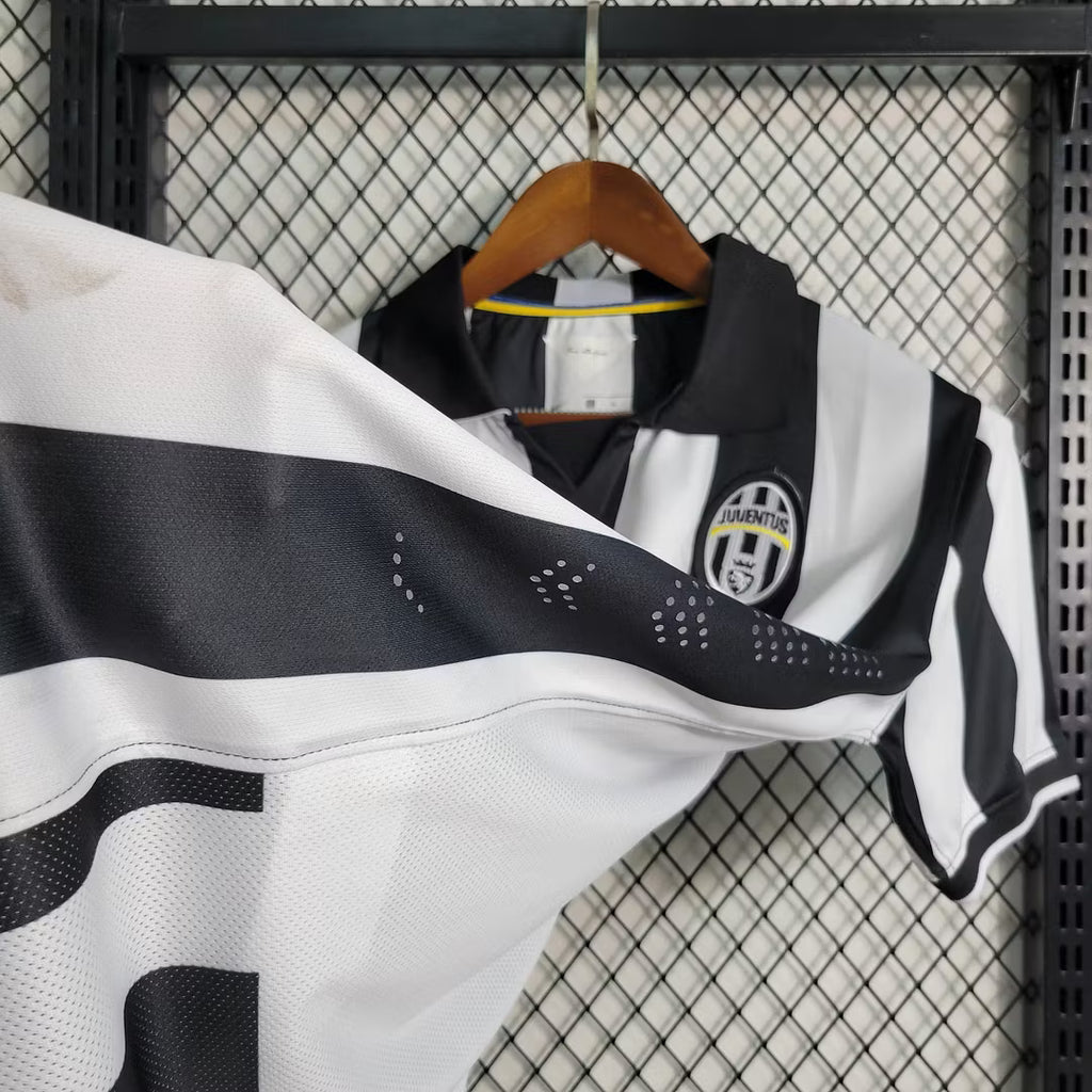 Juventus soccer jersey collar and shoulder details with black and white stripes