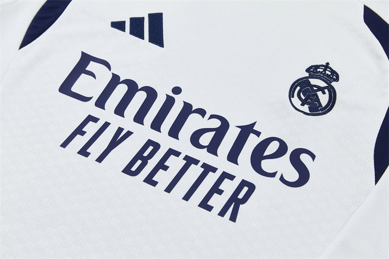White training shirt with Emirates Fly Better print and Real Madrid crest