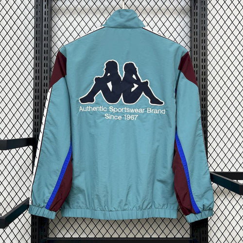 Light blue windbreaker back with large logo print and stand collar