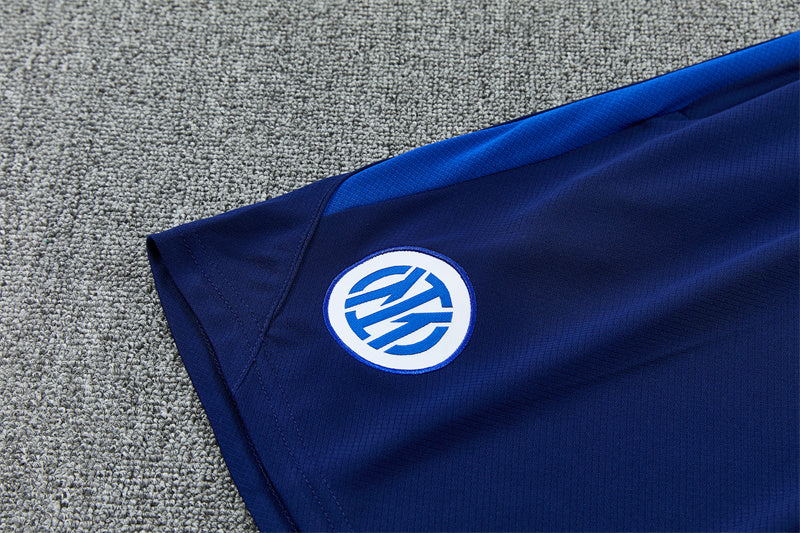Blue training shorts with round team crest patch and Nike swoosh