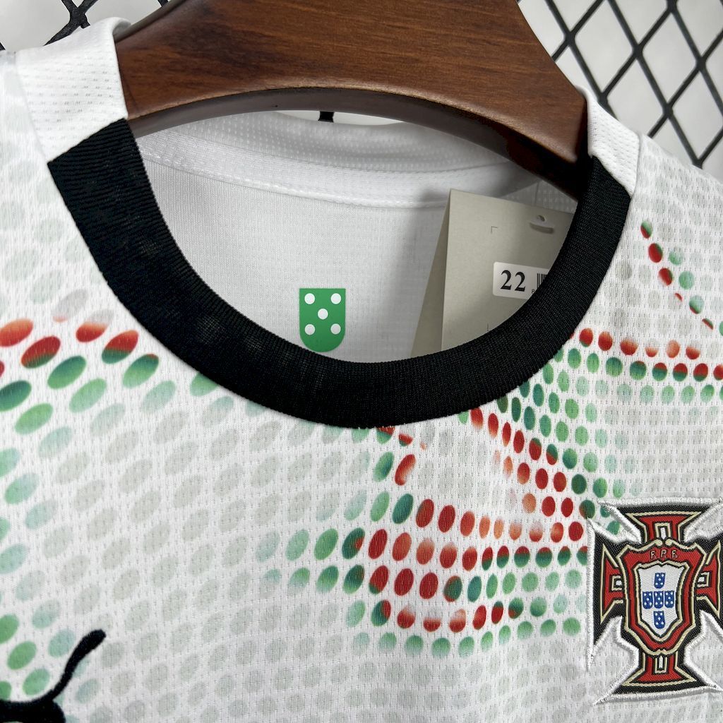 Kids Portugal away jersey collar: black trim with small Portugal crest patch