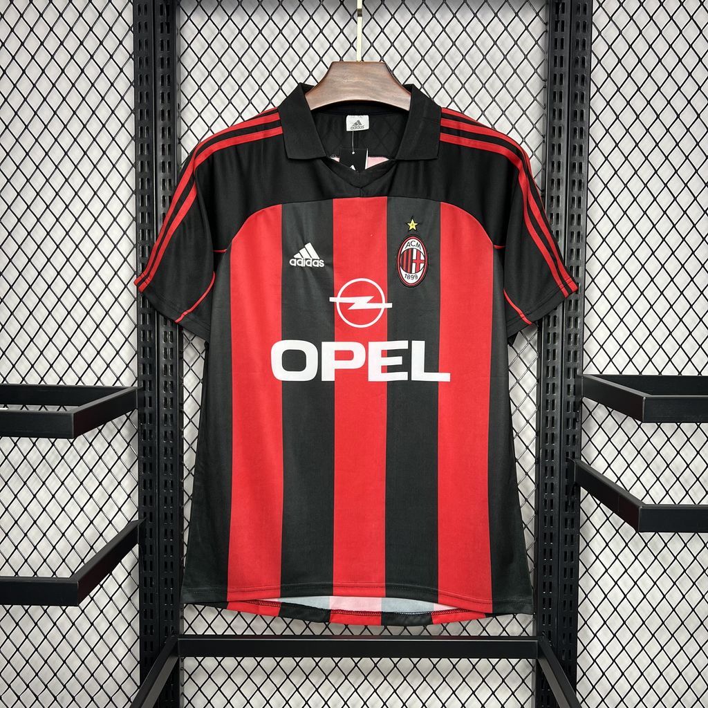 Black and red striped soccer jersey with Adidas logo and Opel sponsor print