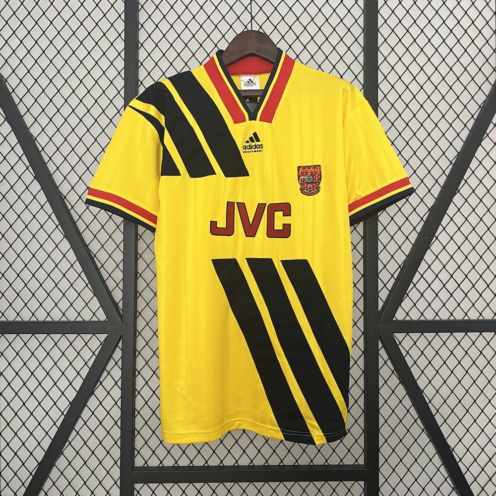 Yellow retro football jersey with navy diagonal stripes, red trim, Arsenal crest and JVC logo