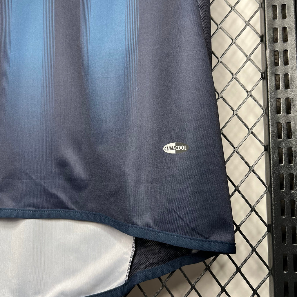 Away soccer jersey hem close-up, climalcool logo and white lower panel