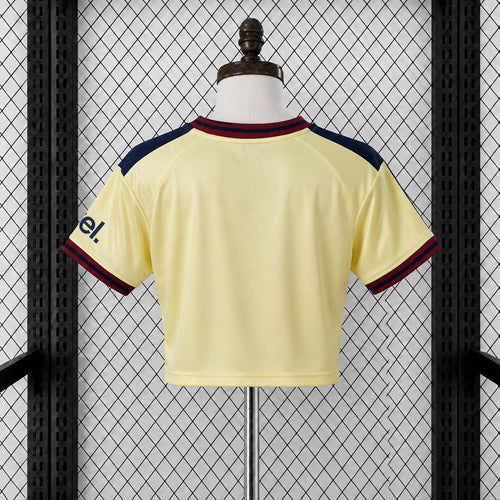 Women’s cropped football jersey back in pale yellow with navy/red trim