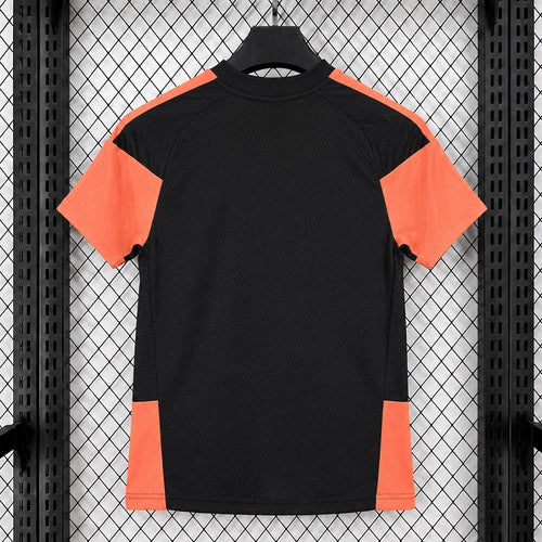 Black training top with orange shoulder and sleeve panels, crew neck