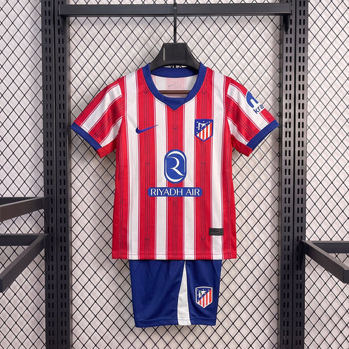 Kid home soccer jersey and shorts, red with vertical white stripes and blue shorts
