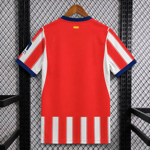 Red football jersey back with navy collar and white striped sleeve panels