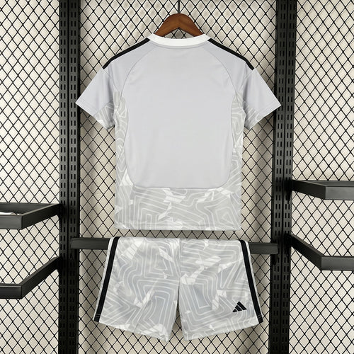 Kids' goalkeeper football kit, white back jersey with black trim and grey graphic shorts