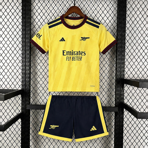 Kids yellow football shirt and navy shorts, red trim, Adidas logo and Arsenal badge