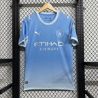 Manchester City home football jersey in light blue with Etihad Airways sponsor and crest
