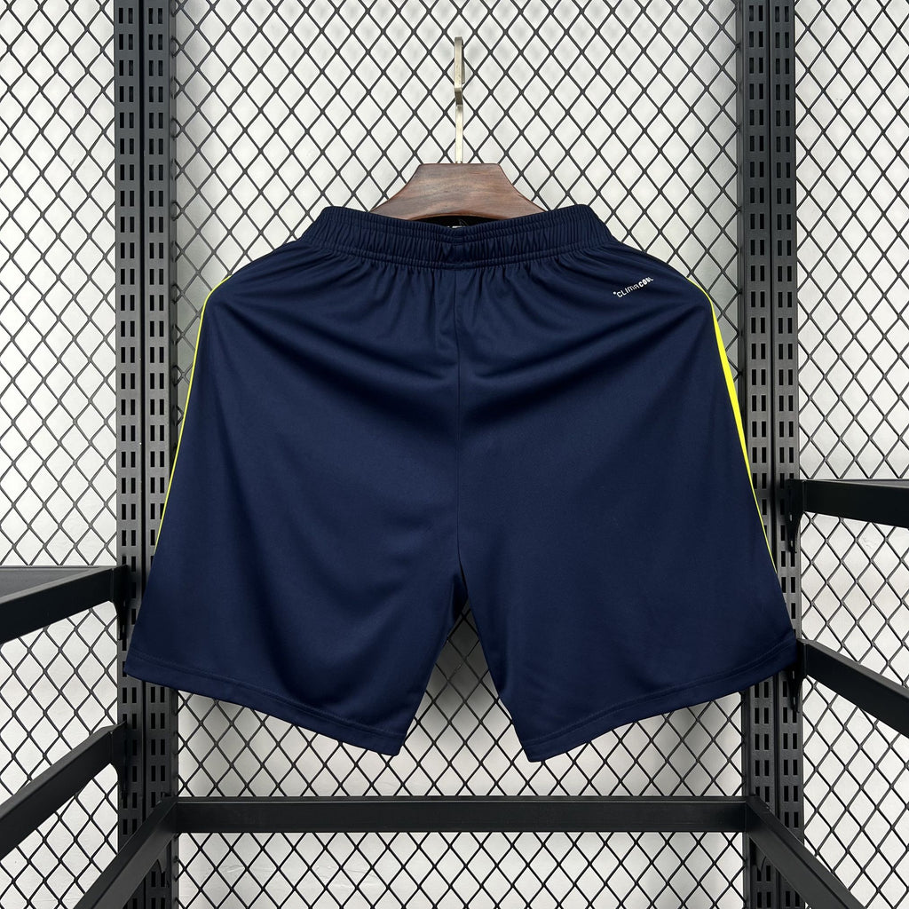 Navy football fan shorts with neon yellow trim and elastic waistband