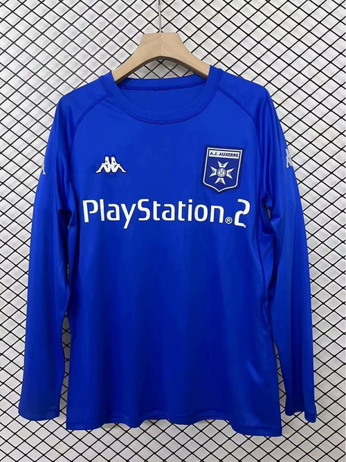 Blue long-sleeve football jersey with club crest and PlayStation sponsor