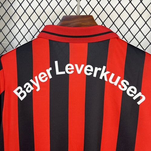 Men's football jersey back with red and black vertical stripes and white “Bayer Leverkusen” print