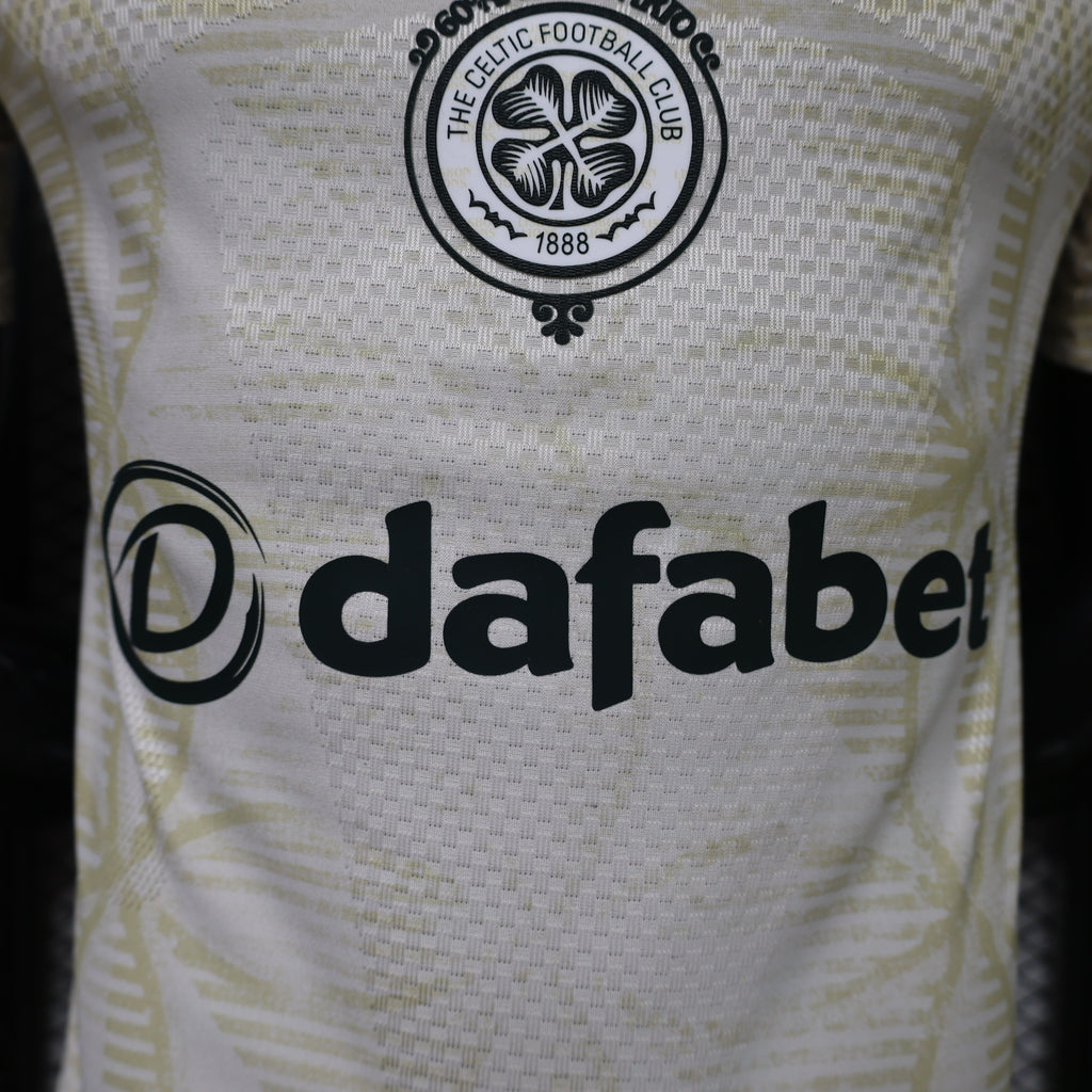 Light yellow jersey with Celtic FC round crest and black dafaBet sponsor