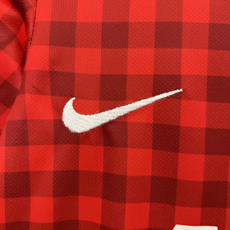 Kids red plaid jersey with white Nike swoosh logo