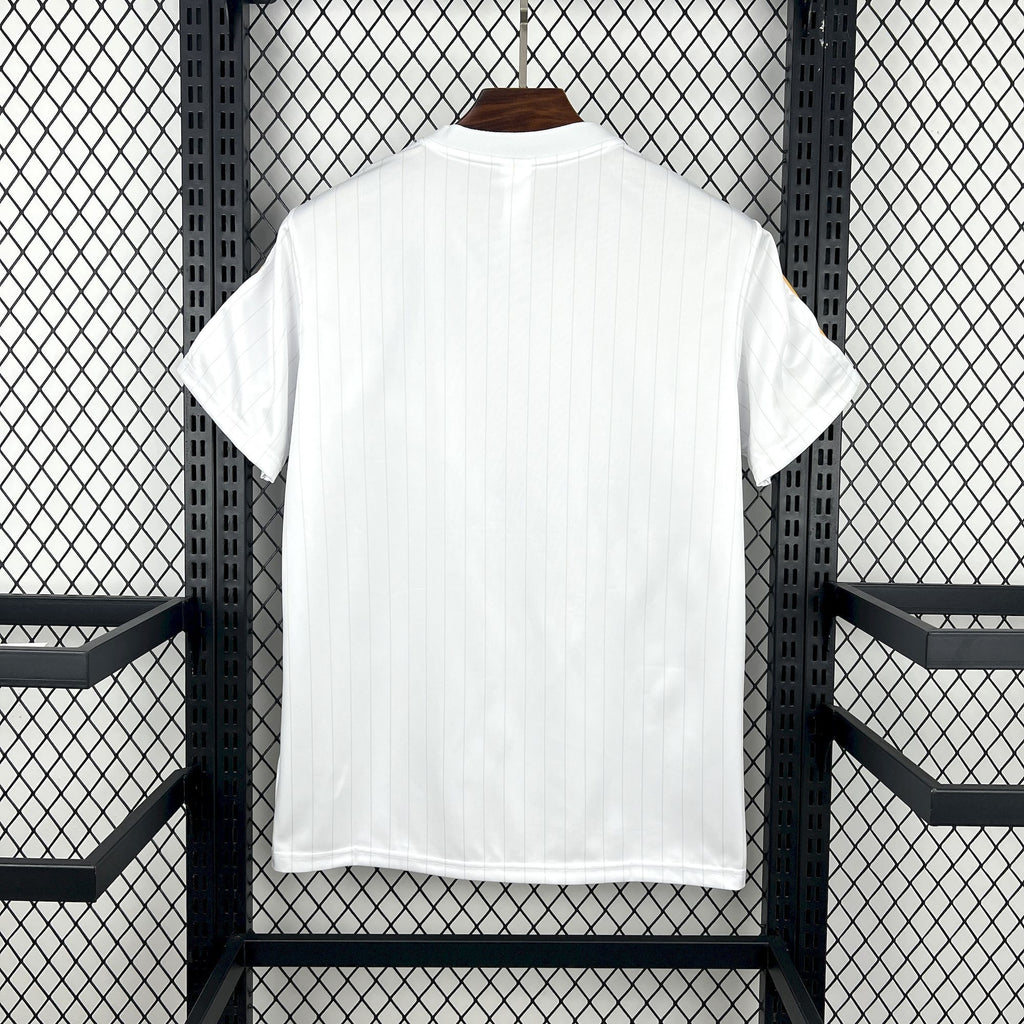 White Real Madrid football jersey back view with clean crew neck and short sleeves