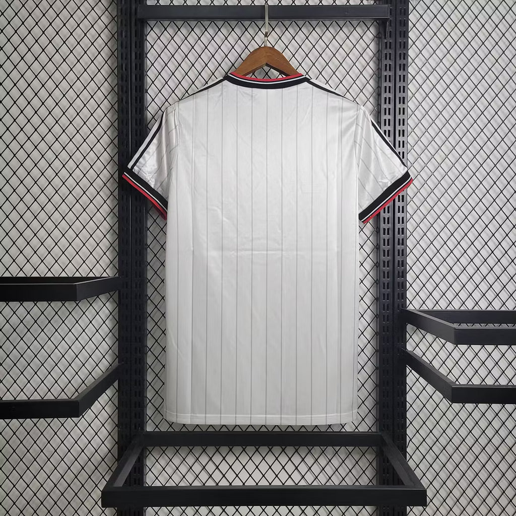 White retro football jersey back view with black/red collar trim and sleeve stripes