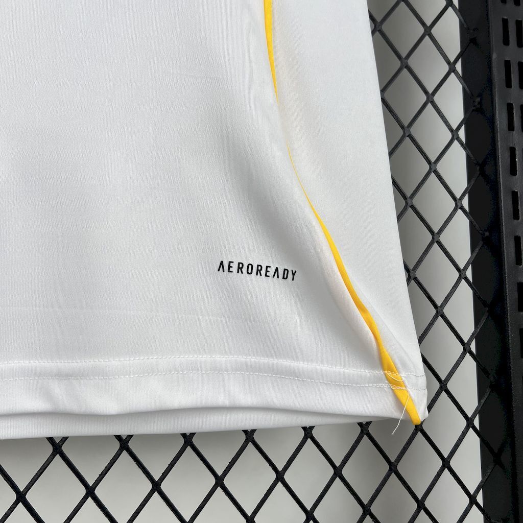 Women’s white football jersey sleeve with yellow piping and AEROREADY logo