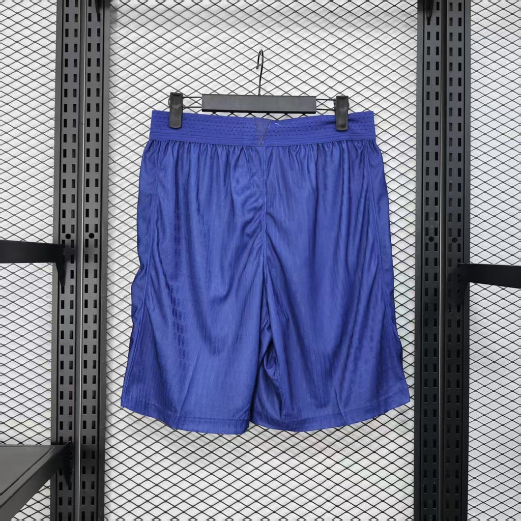 Blue player shorts with elastic waistband and red side stripe