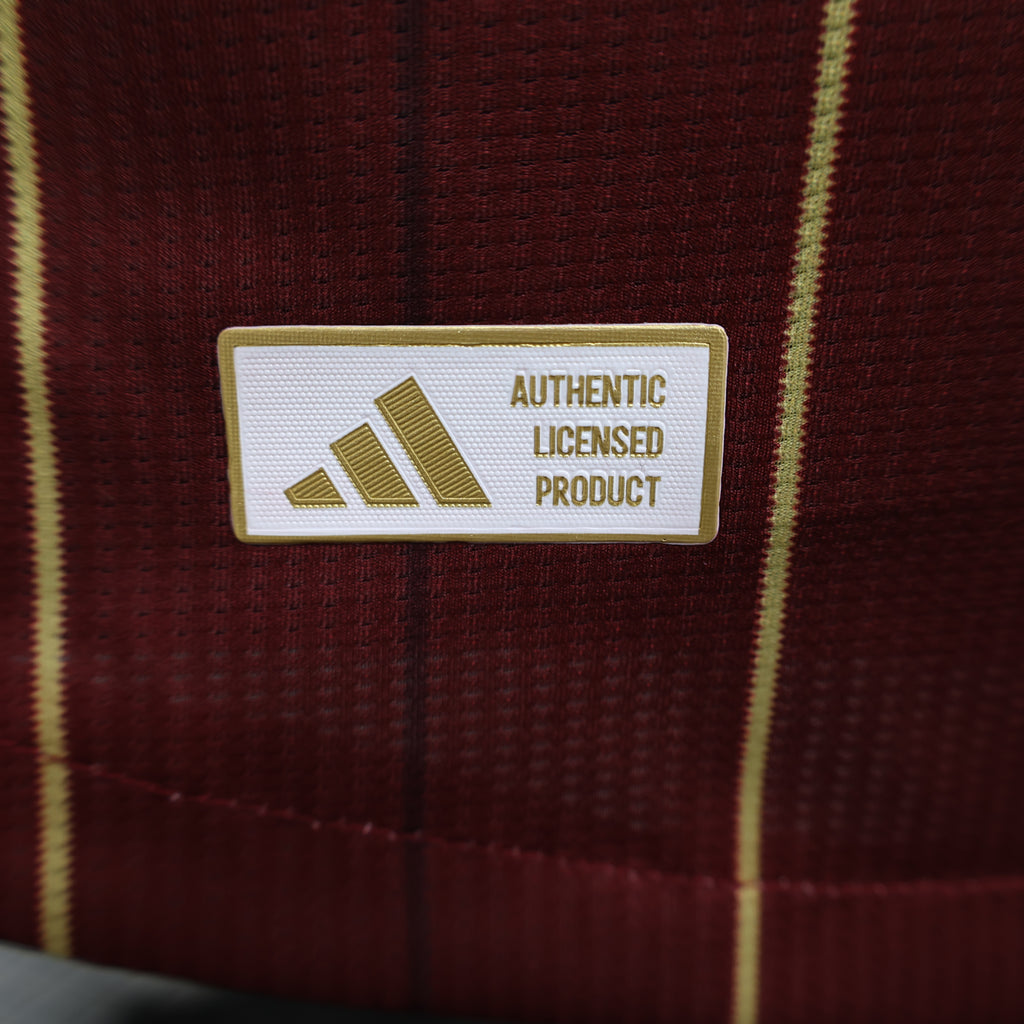 Close-up of adidas Roma jersey tag reading “AUTHENTIC LICENSED PRODUCT”