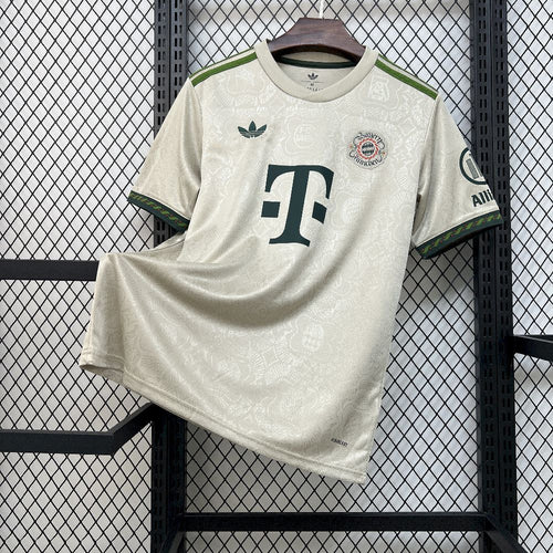 Cream Bayern Munich fan soccer jersey with green trim, crest and JT sponsor logo