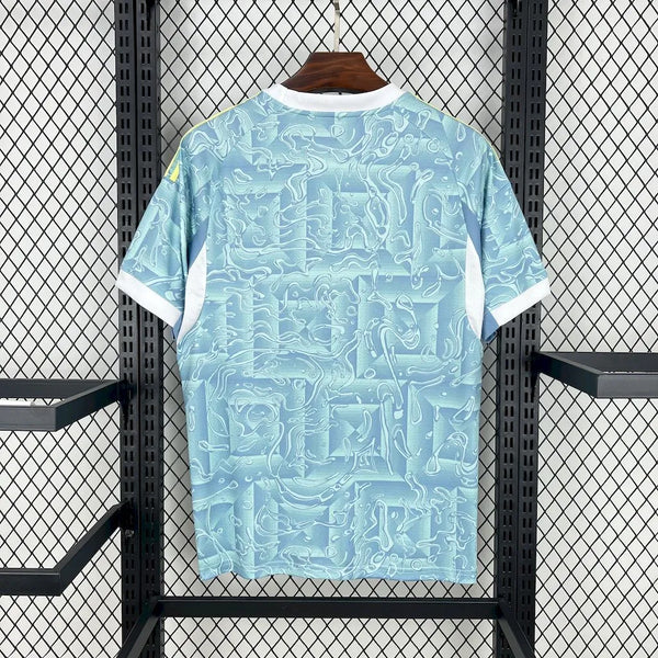 Back of light blue away fan jersey with white trim and abstract graphic print