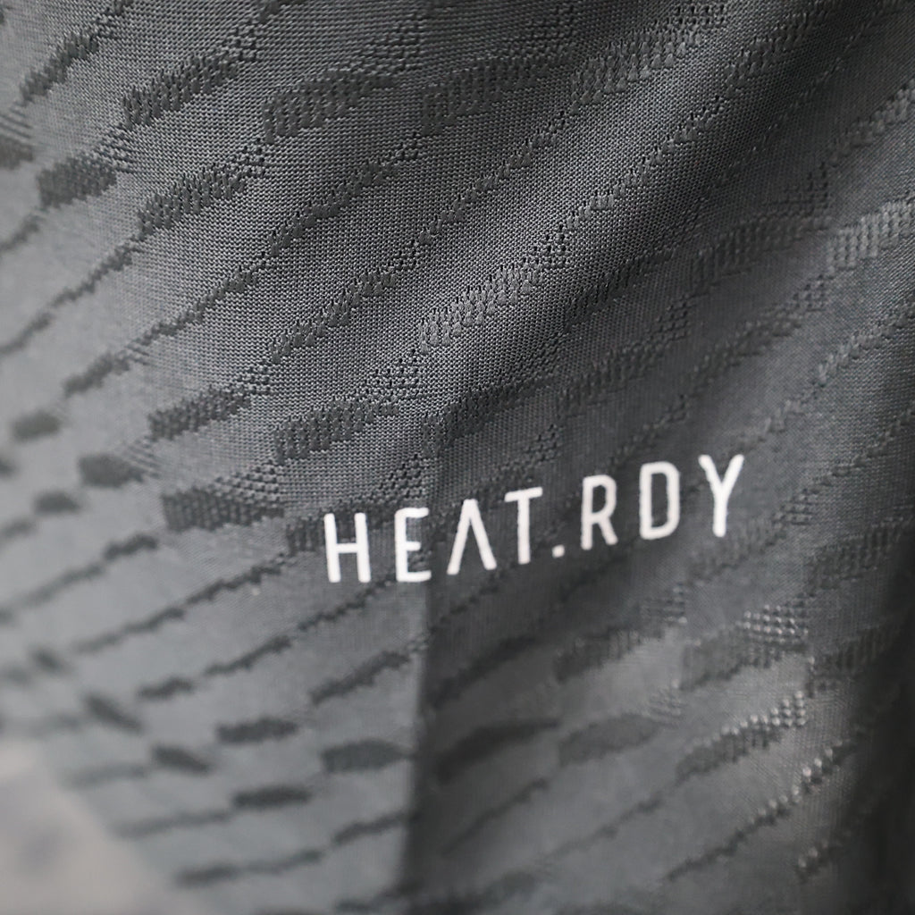 Roma third football jersey, close-up of HEAT.RDY mark on dark knit fabric