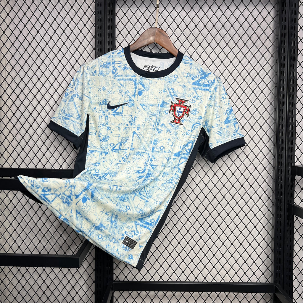 Light blue fan jersey with black sleeve trim and Portugal crest badge