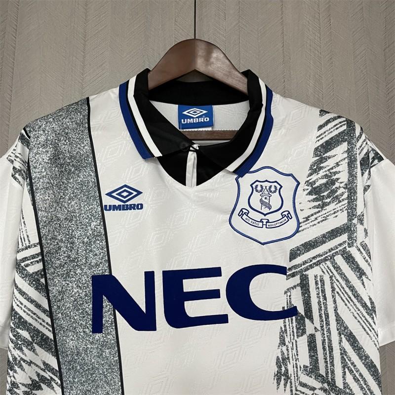 Retro away football jersey front, white with blue trim collar, Everton crest and NEC sponsor