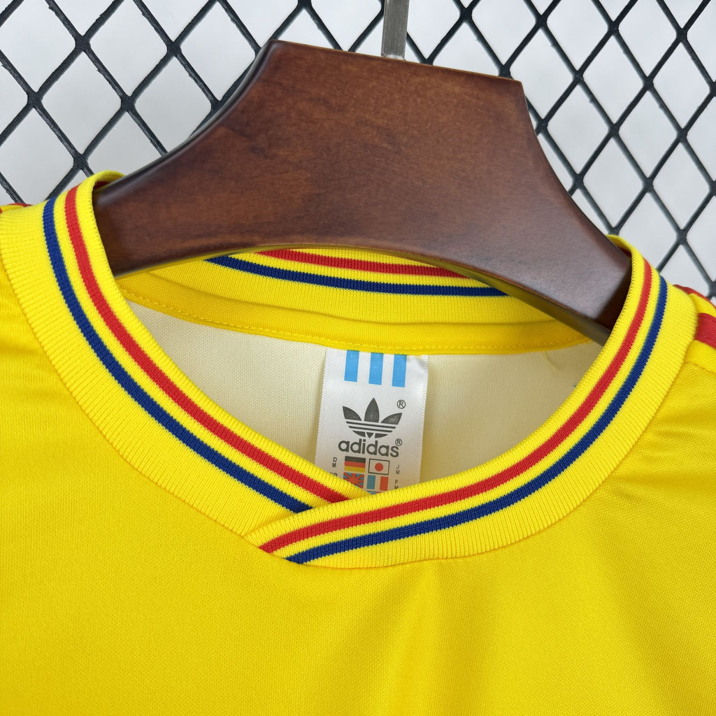 Yellow Colombia jersey neckline with ribbed collar trim and adidas label at the inside