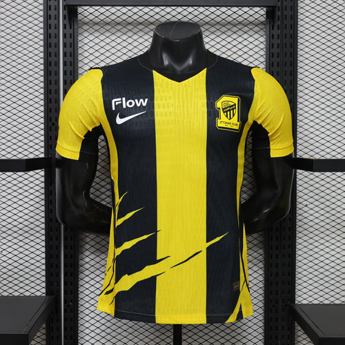 Yellow and black striped soccer jersey, home player version, short sleeves and crew neck.