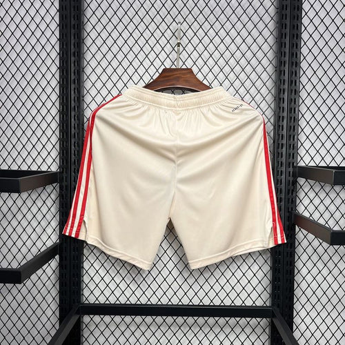 White football fan shorts with red side stripes, back view