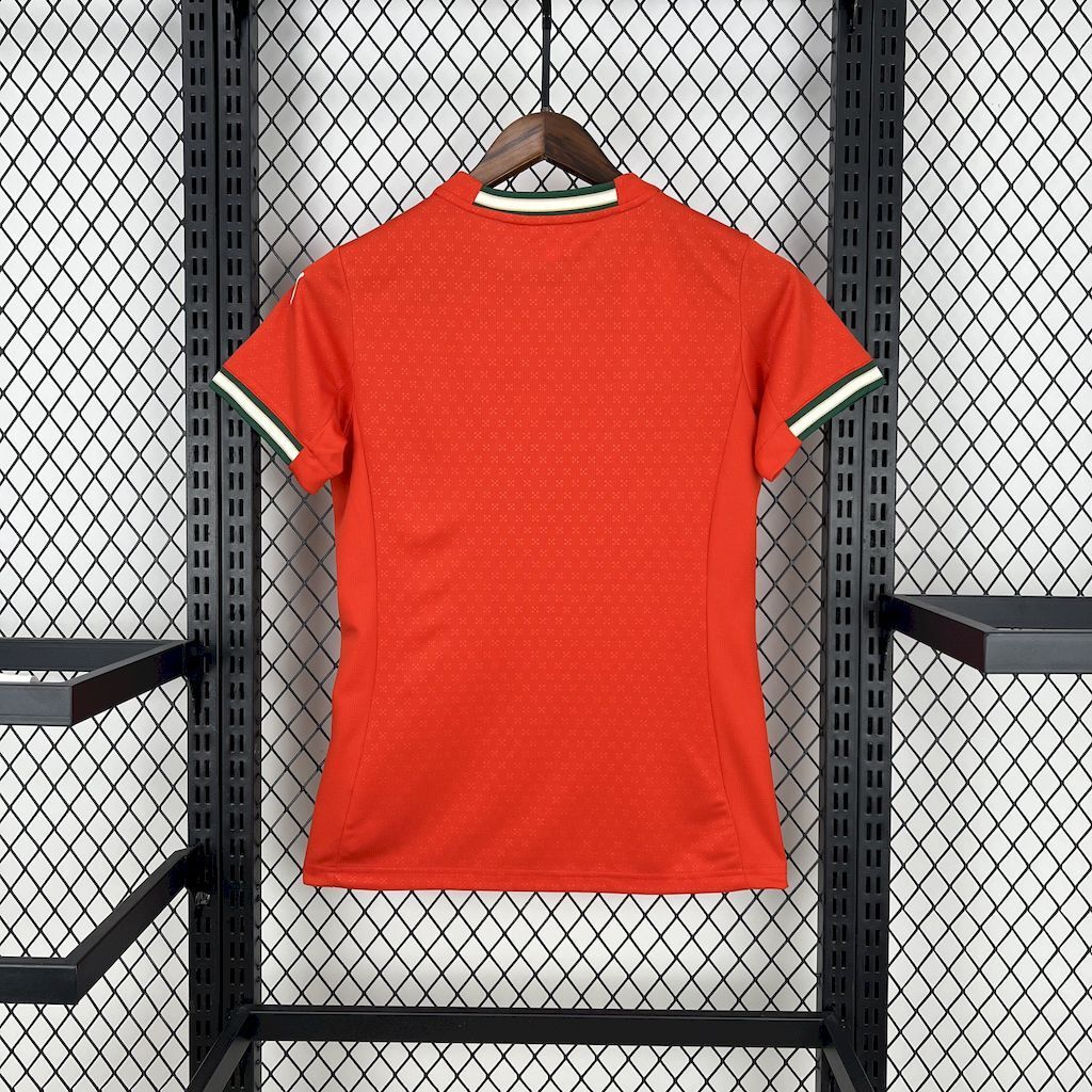 Women's red home football jersey back view with green-trim neckline and Puma logo