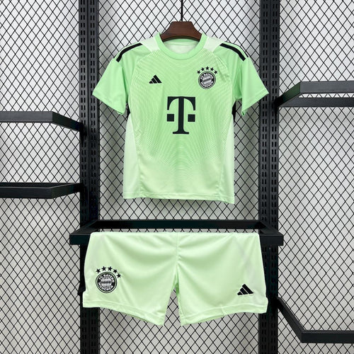 Green Bayern Munich kid goalkeeper jersey and shorts kit with black trim and crest