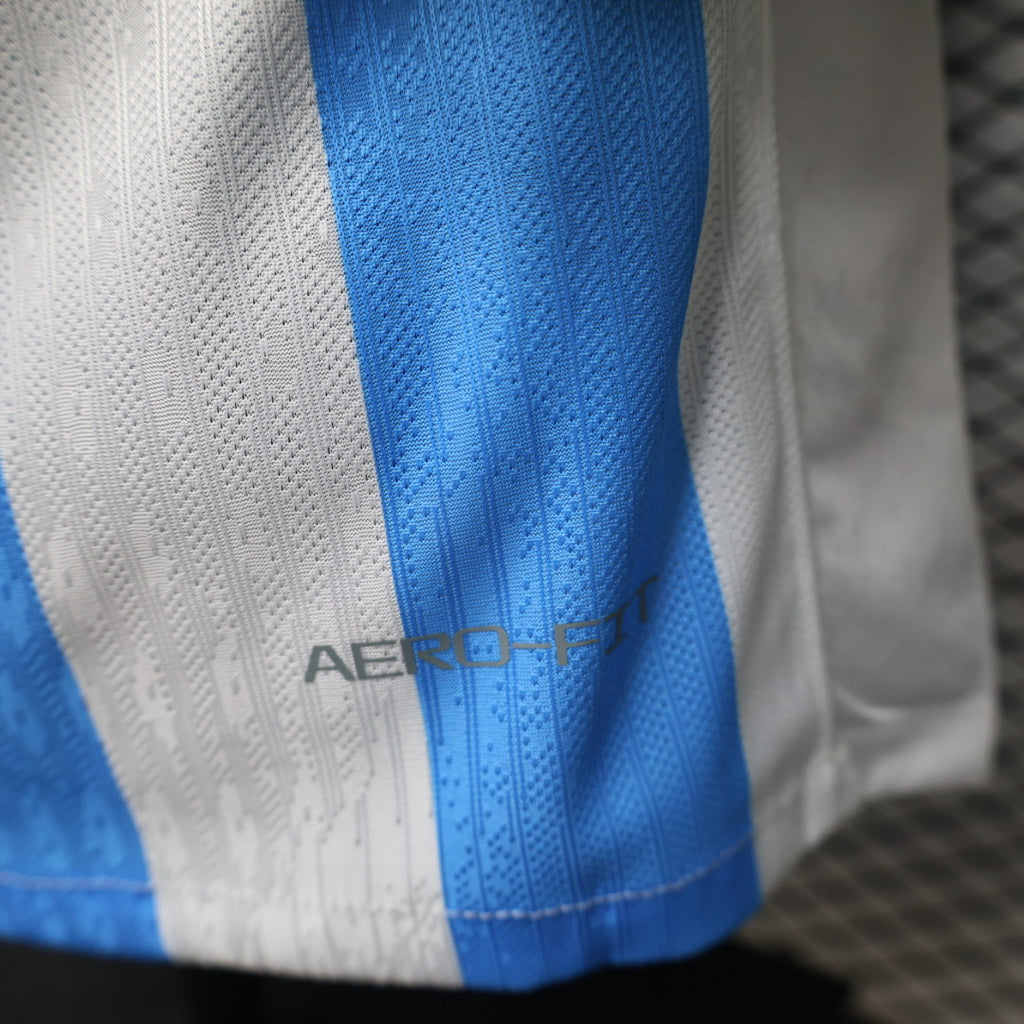 Soccer jersey side panel with AEROREADY logo on blue-and-white fabric